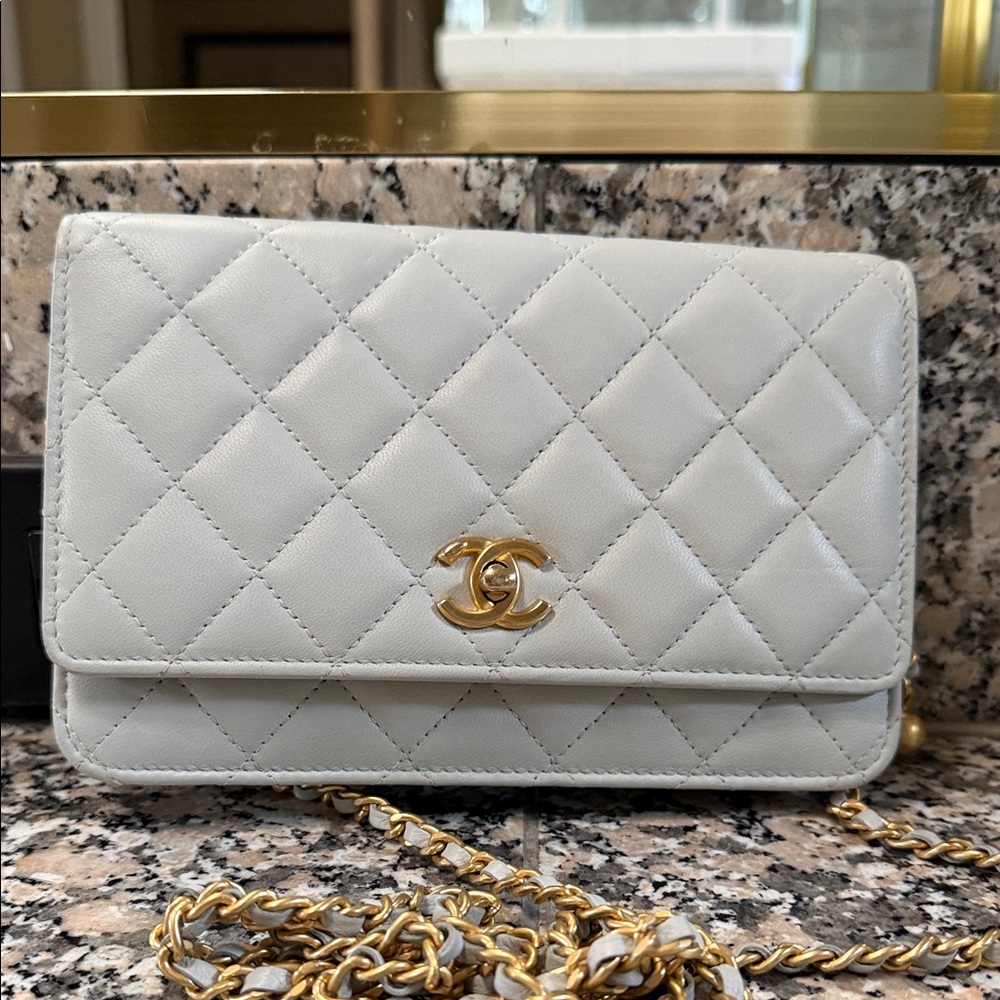 Chanel Light Blue Quilted Crossbody Bag with Gold Accents